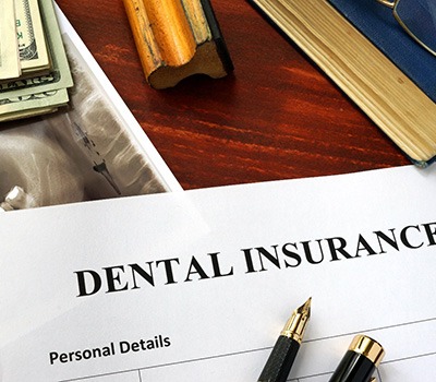 Dental insurance form on a table